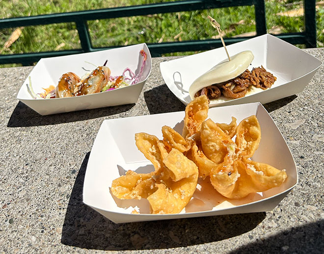 snacks from Epcots Flower and Garden Festival - crab rangoons, dumplings, and bao buns.