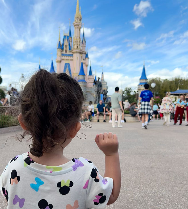 Toddler in from of Cinderella Castle at Magic Kingdom