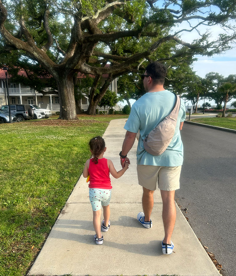 dad and daughter walking